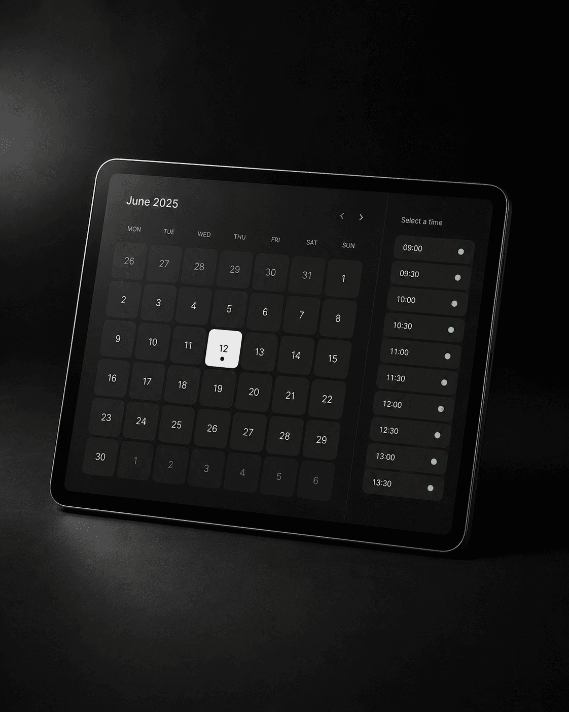 Tablet showing a calendar with selectable booking slots